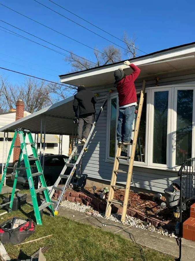 Restoration crew performing exterior repair in Dalton